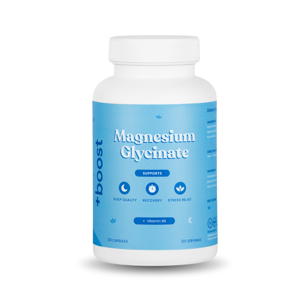 +boost Magnesium Glycinate supplement bottle with label, showing white tablets next to the container on a neutral background.