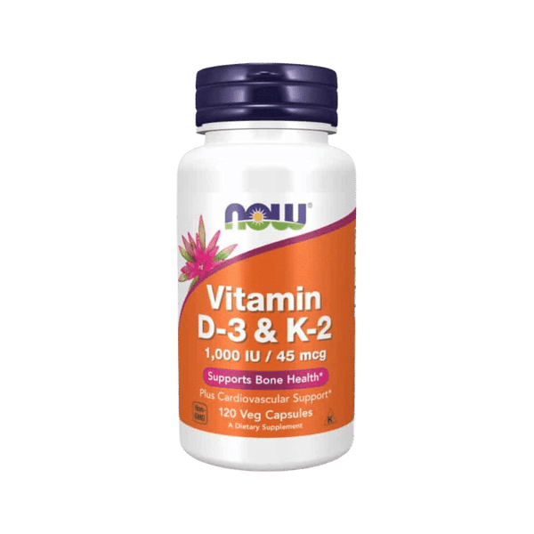 Now Foods Vitamin D3 and K2 supplement bottle, showing label with dosage information, in a natural light setting.